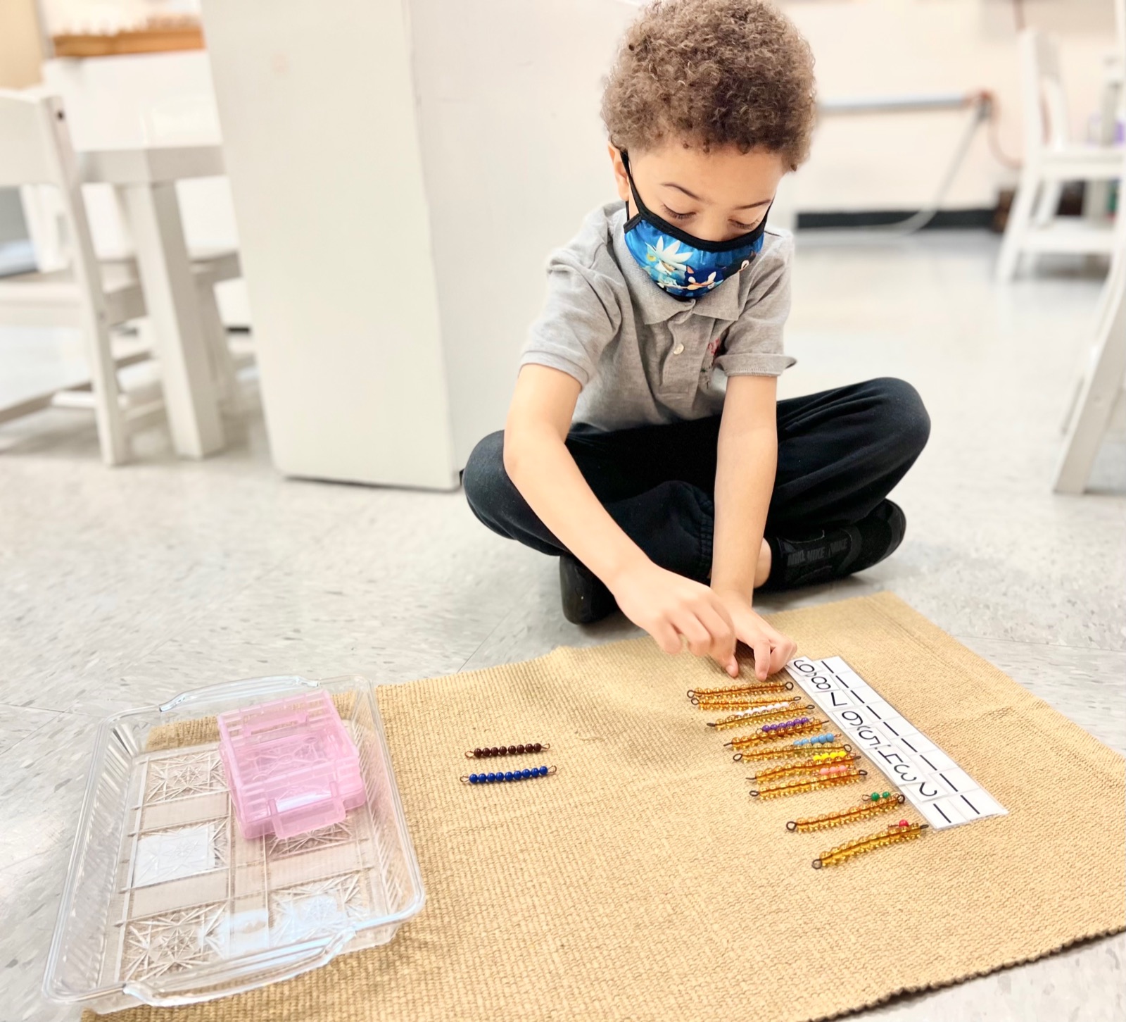 Colored bead bars on a work mat