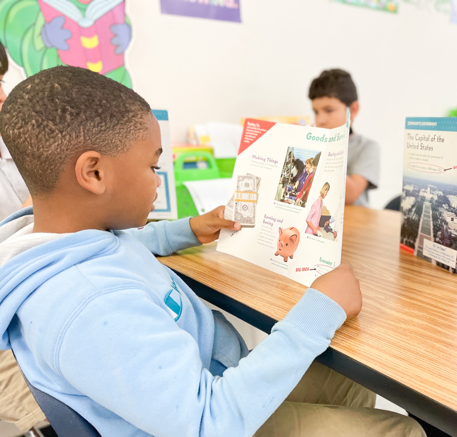 A student reading a magazine